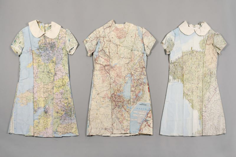 Three small dresses, made out of maps