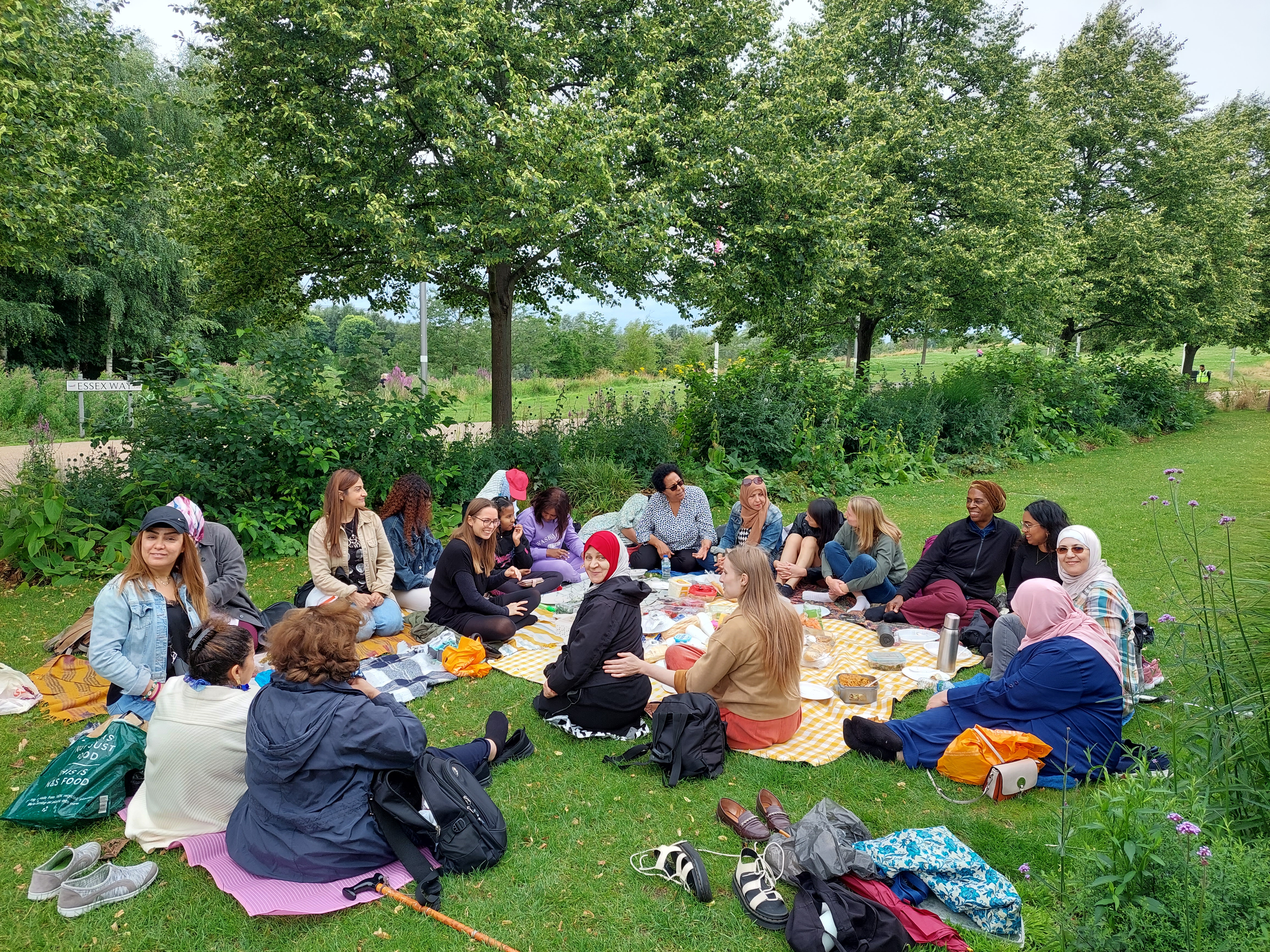 Women sat having a picnic